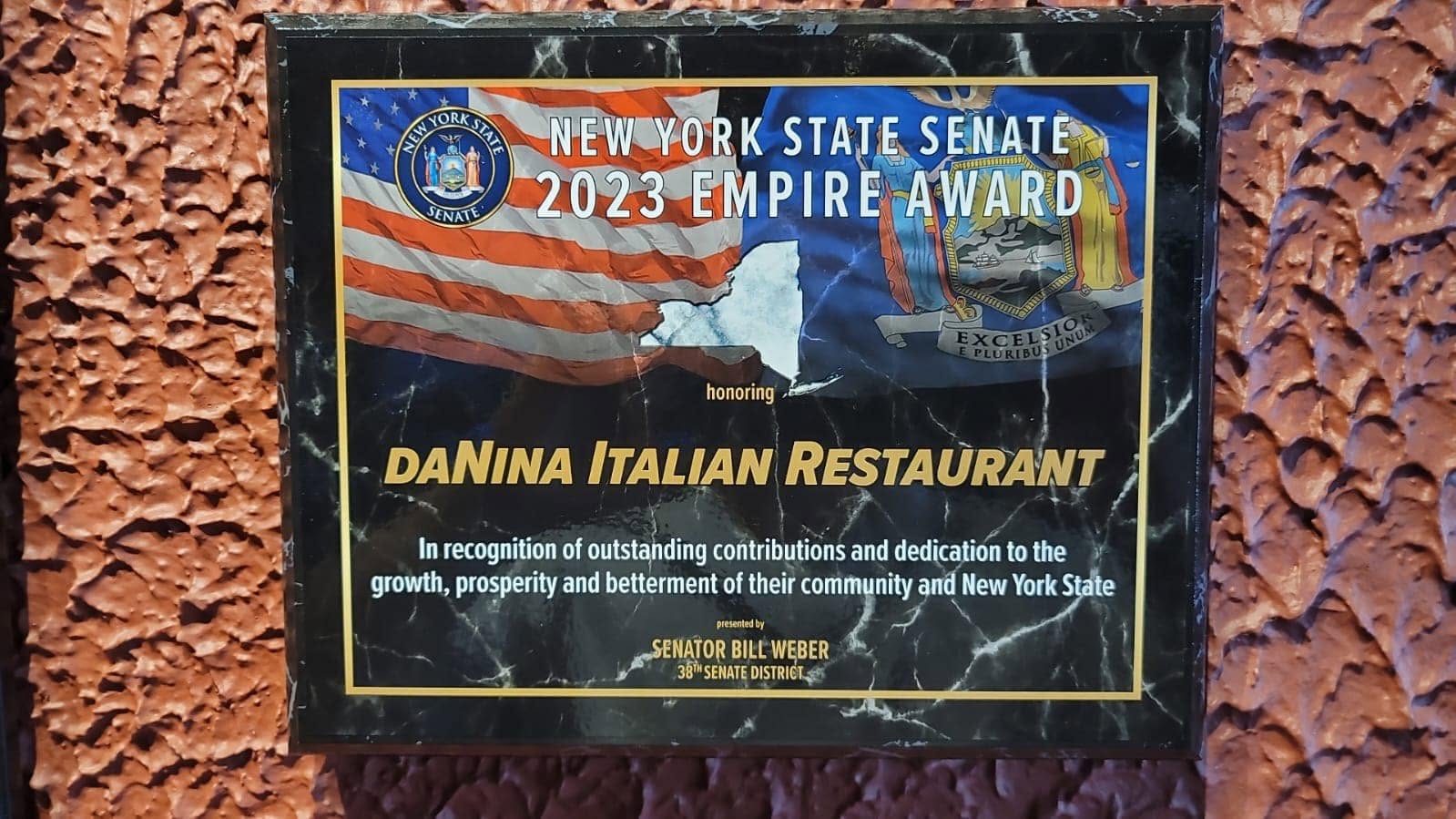New York State Senate 2023 Empire Award plaque presented to Da Nina Italian Restaurant